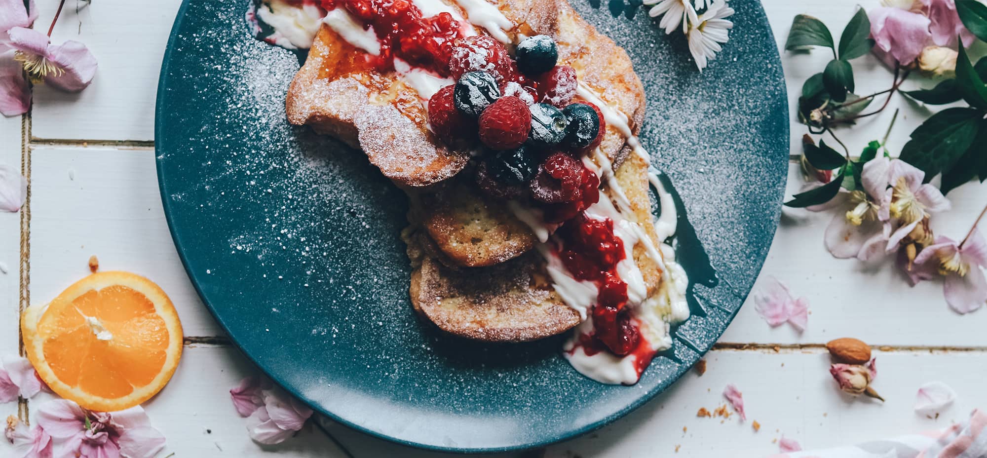 This photo is of French toast presented with fresh berries